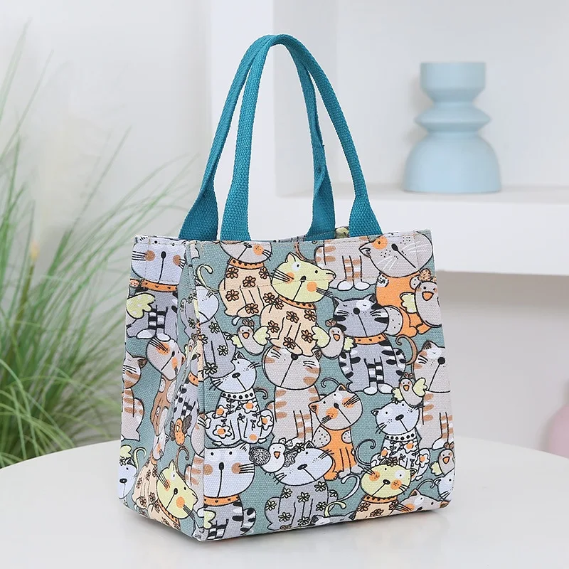 Bolsa de mão portátil feminina com desenho de desenho animado e grande capacidade. Leve tudo o que precisa com estilo e praticidade. — foto 4