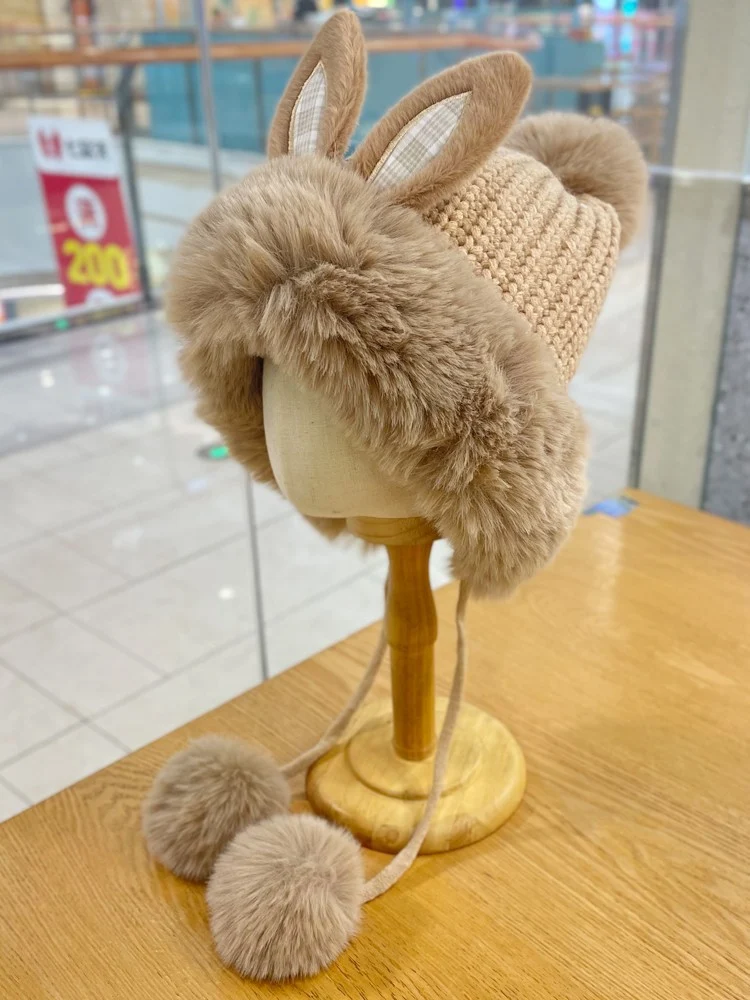 Touca infantil de tricô com orelhas de coelho estilo Lei Feng, quentinha e fofa para o inverno, protege do frio e deixa as crianças estilosas. — foto 10