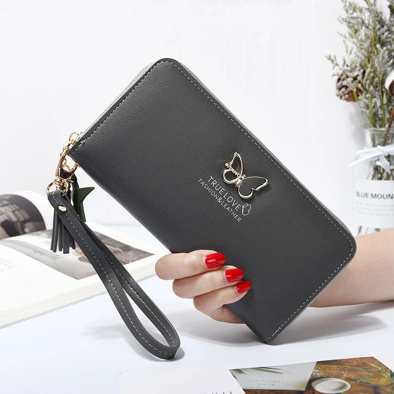 Clutch feminina coreana em metal vazado com design de borboleta, perfeita para festas e eventos, um acessório elegante e charmoso. — foto 8
