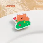 Flower picking bear