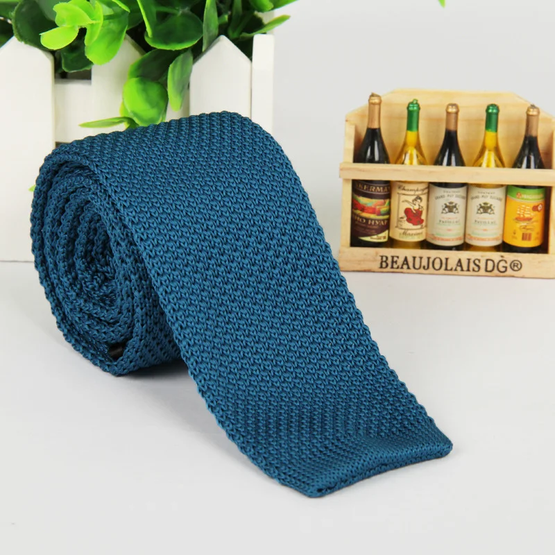 Title 9, Mens solid-color knitted tie. Elevate your sty...