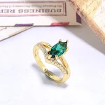 Anel feminino com zircônia de oliva colorida incrustada em cobre, perfeito para adicionar um toque elegante e vibrante ao seu visual. — foto 4