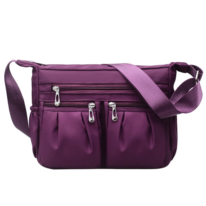 Bolsa feminina de ombro de nylon com bolsos duplos diagonais e múltiplos compartimentos, prática e espaçosa para o dia a dia. — foto 3