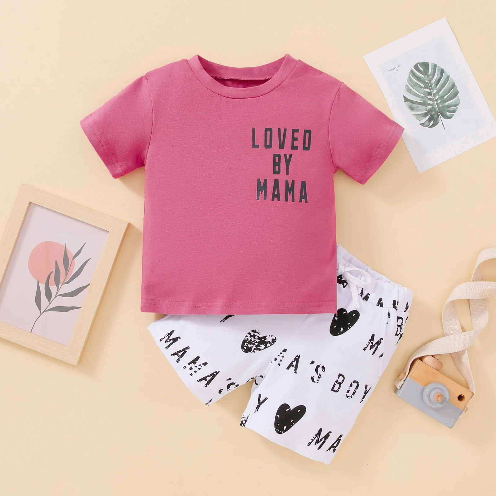 Conjunto infantil casual de camiseta com letras e shorts, perfeito para o dia a dia. Conforto e estilo para brincar, ideal para atividades ao ar livre. — foto 12