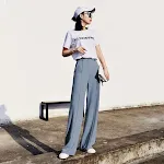 Calças de terno retas soltas e finas masculinas. Calças casuais com caimento fluído e efeito de arrastar. Conforto e estilo para o dia a dia. — foto 3