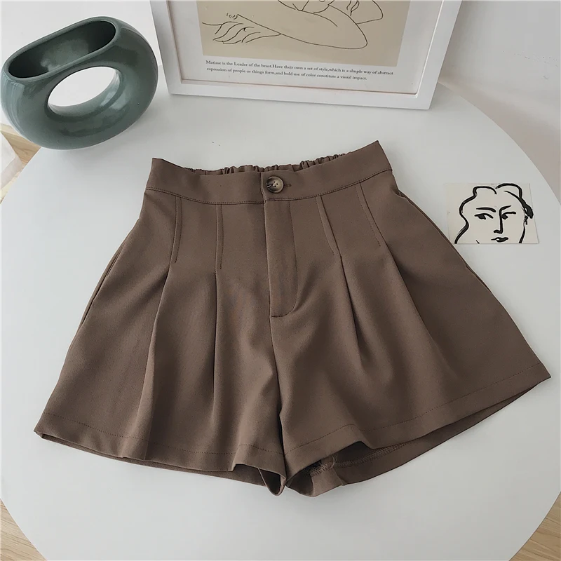 Dames zomer shorts met hoge taille en losse pasvorm, ideaal voor casual looks en comfort op warme dagen. Stijlvol en perfect voor de zomer. — foto 1