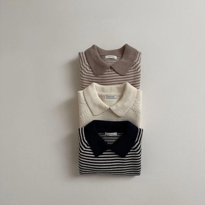 Suéter infantil de malha com gola polo e listras. Conforto e estilo para os pequenos em qualquer ocasião. Perfeito para um visual charmoso e aquecido. — foto 7