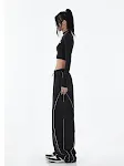 Calças esportivas pretas skinny, cintura alta retrô, funcionais, soltas e versáteis, combinando estilo e conforto para diversas atividades. — foto 8