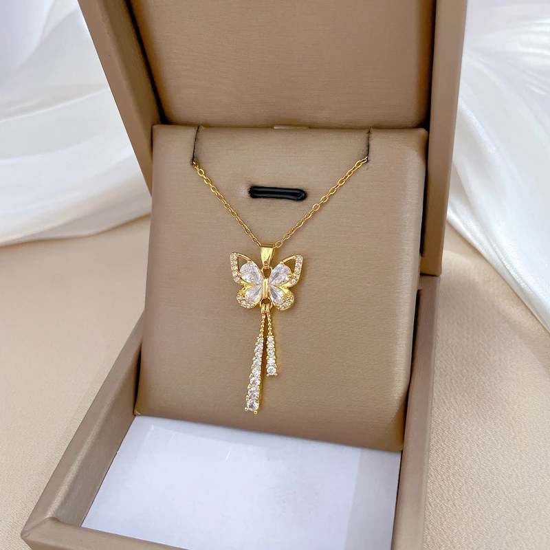 Colar feminino de borboleta com diamantes e tassel. Adicione brilho e sofisticação ao seu visual com este colar deslumbrante, ideal para presentes. — foto 3