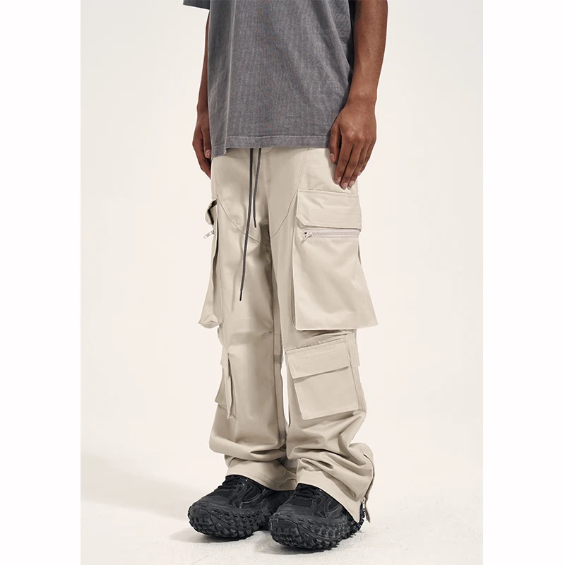 Calças casuais masculinas retrô com múltiplos bolsos, velcro e zíper lateral. Conforto e estilo para o dia a dia. — foto 4