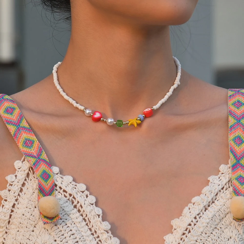 Colar boho coração com contas de resina estrela do mar turquesa, estilo oceânico, presente de amor. — foto 11