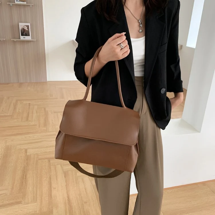 Bolsa feminina casual, simples e prática para o dia a dia. Perfeita como bolsa de ombro ou maleta para trabalho, design diagonal moderno. — foto 6