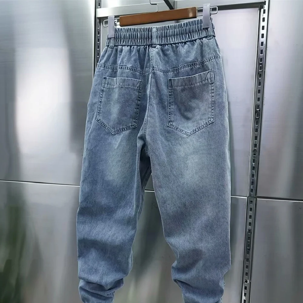 Fashionable washed-out vrijetijdsjeans met enkelbinding, comfortabele en casual stijl, ideaal voor dagelijks gebruik en ontspanning. — foto 2