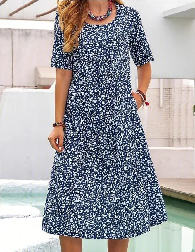 Vestido camisa midi casual com manga curta e bolso, ideal para o dia a dia. Confortável e versátil, perfeito para um visual moderno e descontraído. — foto 3
