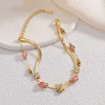 Pulseira feminina em aço titânio com borboleta retrô étnica, ouro 14K, acessório elegante e durável para mulheres. — foto 5