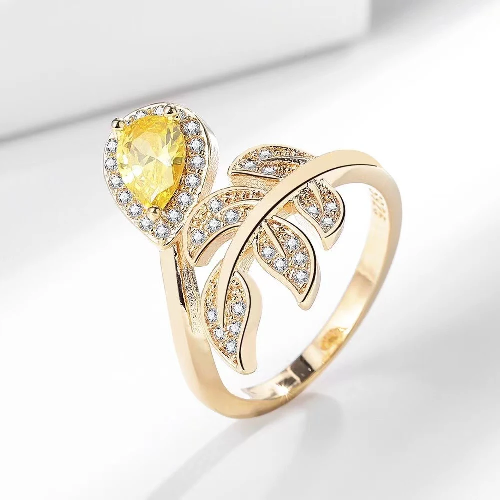 Anel de zircônia de alta qualidade Design Fashion Folhas brilhantes Conjunto de broca Estilo Gangue Joia feminina elegante — foto 1