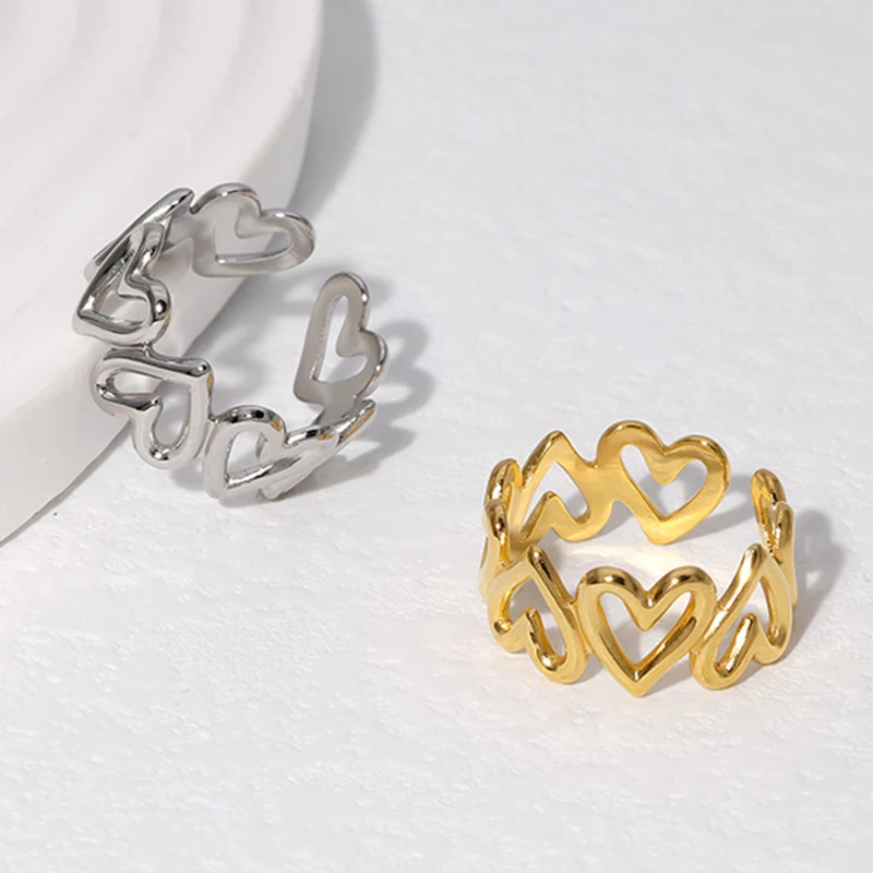 Anel de amor feminino ajustável em aço titânio vazado, design de nicho, perfeito para expressar amor eterno e conexão duradoura. — foto 4