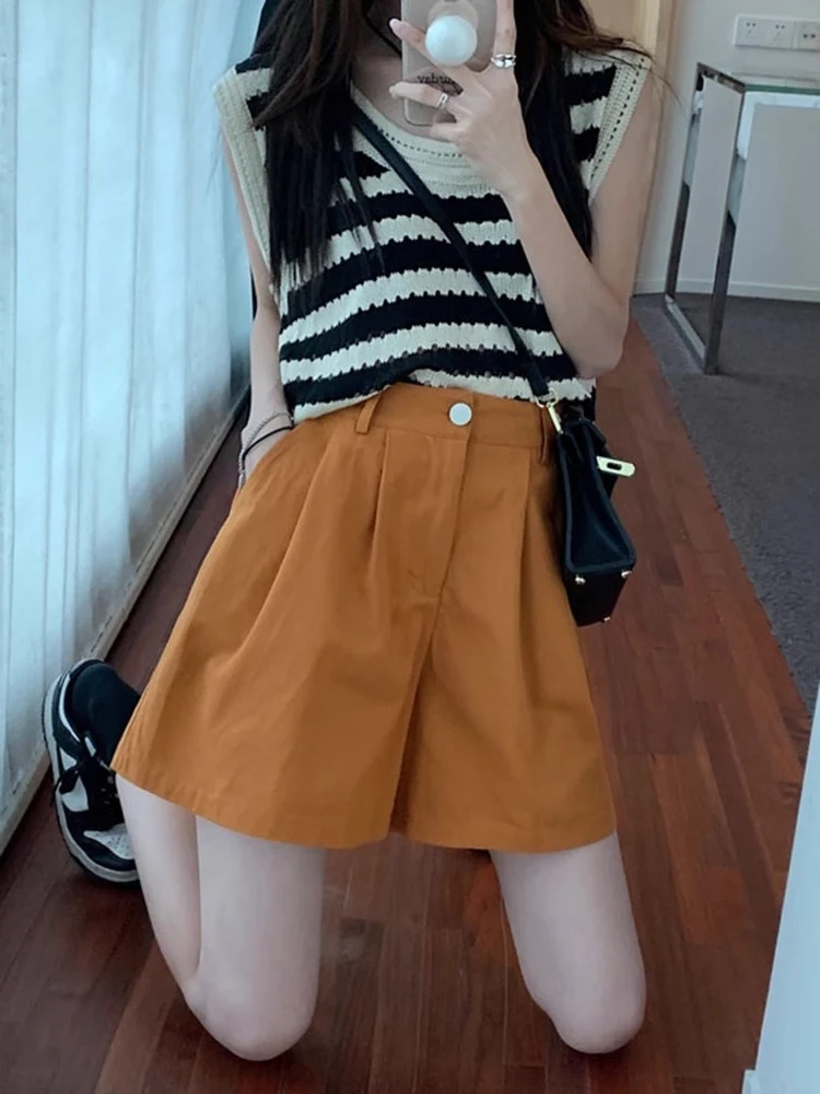 Corduroy casual shorts voor dames met hoge taille en losse pasvorm. Comfortabele en stijlvolle shorts, perfect voor dagelijks gebruik. — foto 13