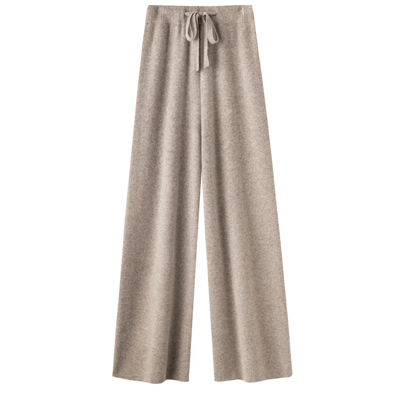 Calças de perna larga em lã pura, cintura média, efeito emagrecedor e casual. Conforto e estilo para um look elegante e moderno. — foto 5