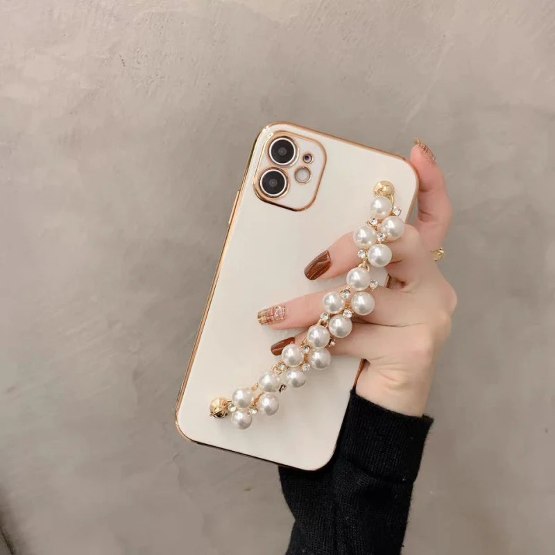 Title 1, Capinha de celular com pulseira de eletroplasti...