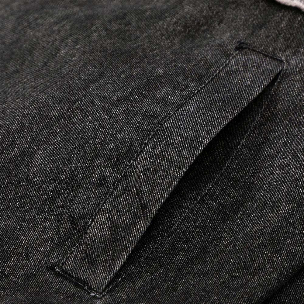 Chaqueta vaquera con cuello alzado y parches estilo europeo y americano. Una prenda versátil y con carácter para un look moderno y atrevido. — foto 12