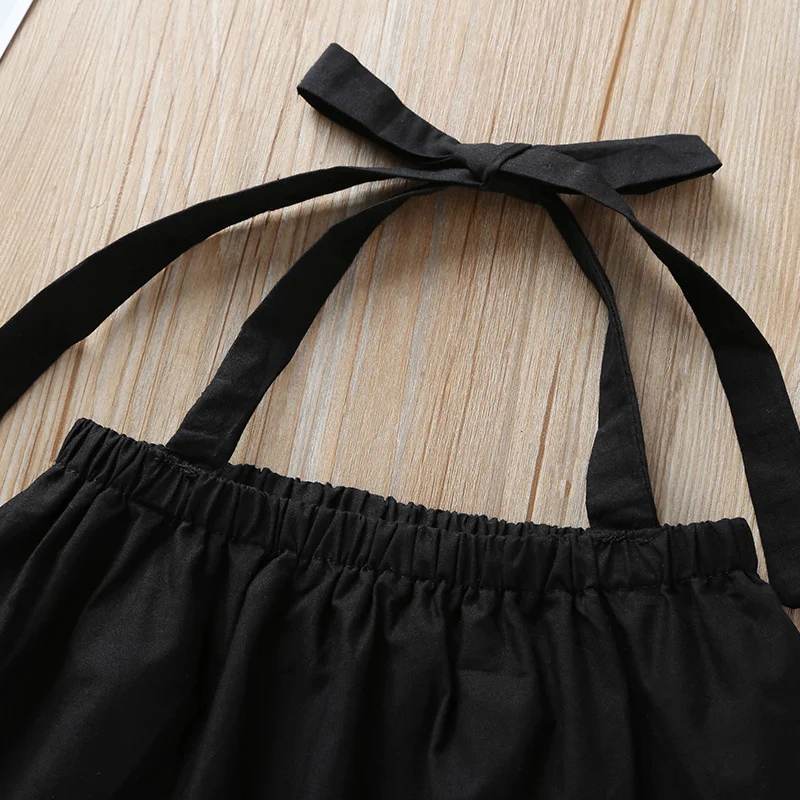 Terno de calça listrada preto e branco com decote halter e plissado para meninas Roupa elegante e charmosa para ocasiões especiais — foto 4