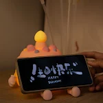 Birthday Cake Bedside Mobile Phone Holder with Small Night Lamp, providing convenient phone access and soft lighting. — photo 1