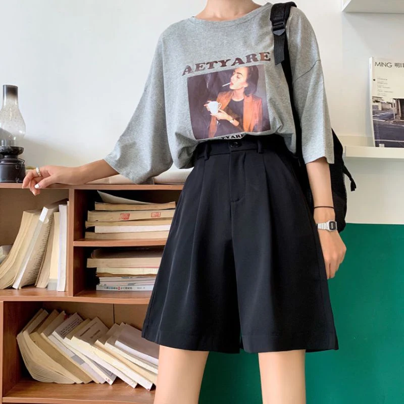 Pantalon cinq points noir, ample, décontracté, à jambes larges, taille haute, coupe ample, grande taille, léger et idéal pour l'été. — photo 4