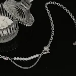 Colar de pérolas multicomponentes em forma de coração de diamante branco e roxo doce e fresco. Elegância e estilo. — foto 6