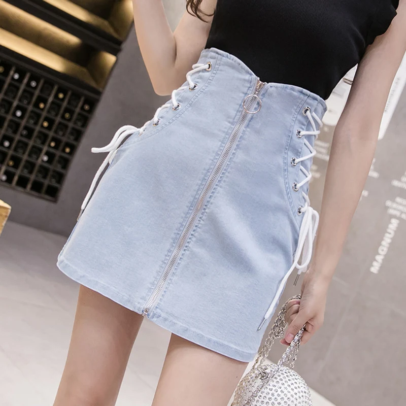 Saia jeans cintura alta, com amarração, modelagem fina e efeito emagrecedor, para um visual elegante e versátil. — foto 6