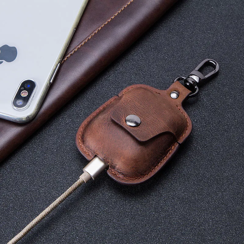 Capa para fone de ouvido portátil em couro com chaveiro Proteja seus fones com estilo e leve-os facilmente. Design compacto e elegante. — foto 8