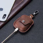 Capa para fone de ouvido portátil em couro com chaveiro Proteja seus fones com estilo e leve-os facilmente. Design compacto e elegante. — foto 8