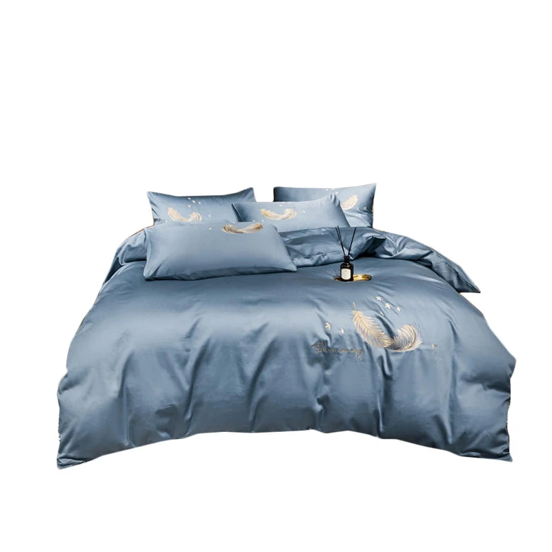 Four-piece cotton embroidery bed set offering comfort and style. Enjoy a restful sleep and add elegance to your bedroom — photo 3