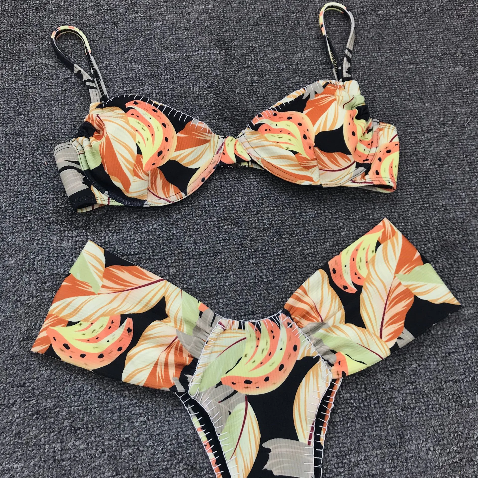 Title 6, Sexy split swimsuit with underwire and gathered...