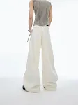 Reflective stripe design suit pants, draped casual style for everyday wear. These comfortable pants offer a modern look — photo 10