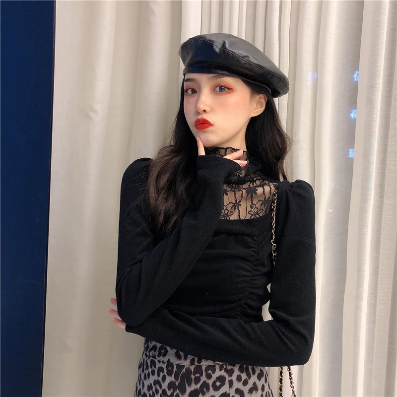 Camisa feminina com gola alta — foto 1