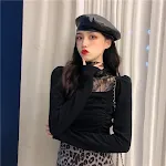 Camisa feminina com gola alta — foto 1