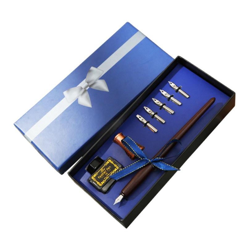 Title 6, Feather Dip Pen Gift Box. Experience elegant ca...