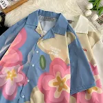 Camicia estiva sottile a maniche corte stampata, casual per coppie. Leggera e traspirante, perfetta per il caldo. Look rilassato e alla moda. — foto 11