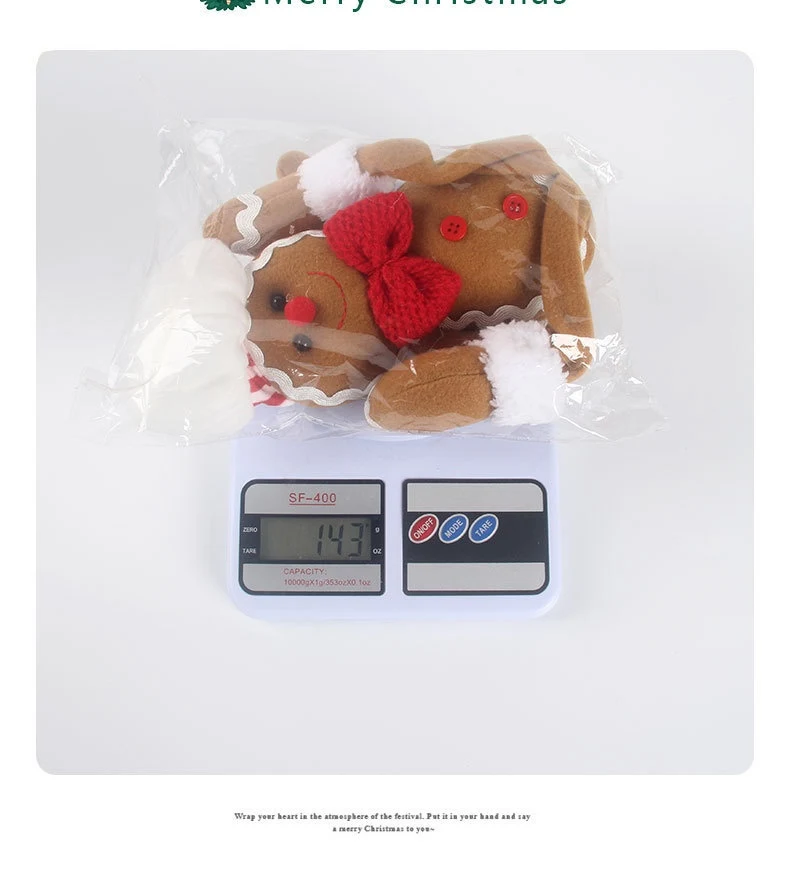 Title 2, Christmas Gingerbread Man Hanging Leg Doll, a f...