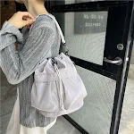 Bolsa tipo balde com cordão de nylon à prova d'água, grande capacidade, perfeita para transportar seus pertences com segurança e praticidade. — foto 12