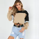Suéter outono patchwork com gola redonda e amarração — foto 11