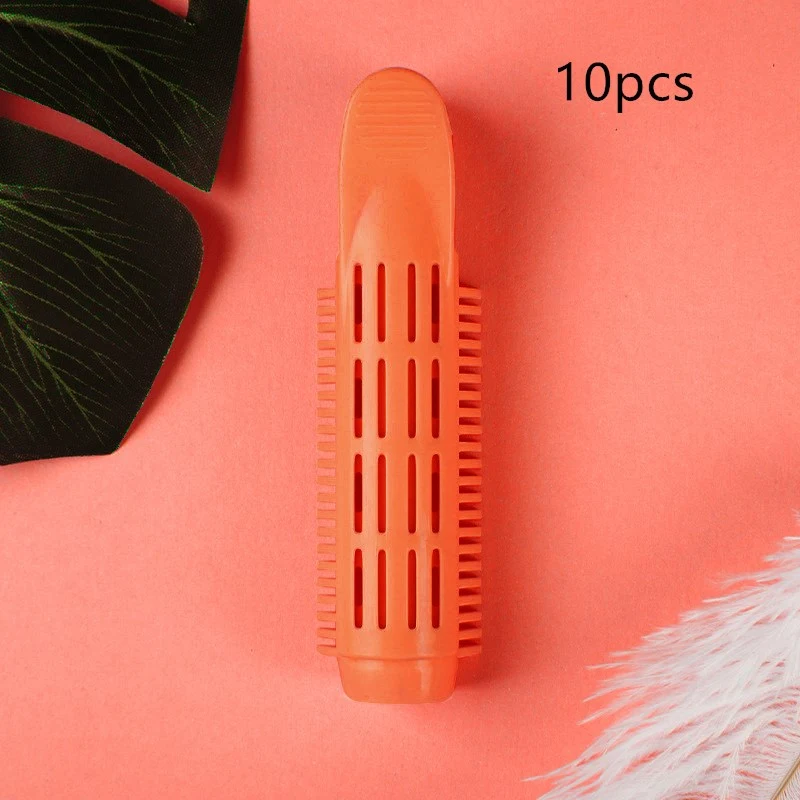 Clip para modelar franja e raiz, secagem com ar quente, adiciona volume e estilo ao cabelo, criando penteados cheios e com movimento. — foto 16