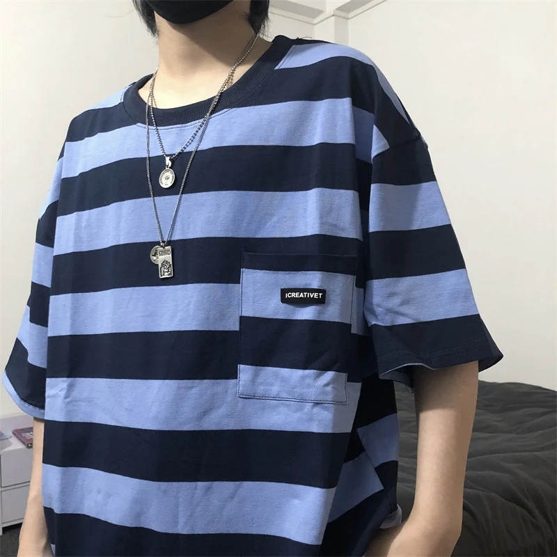 Striped short sleeve t-shirt, a comfortable and versatile essential. Perfect for casual wear, this breathable tee offers — photo 12
