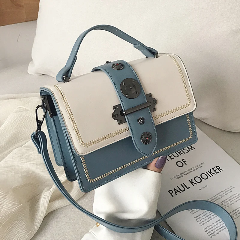 Bolsa mensageiro versátil com contraste de cores, ideal para trabalho e uso diário. Design moderno e funcional. — foto 5