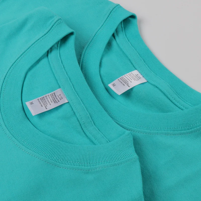 Camiseta japonesa básica branca de gola redonda e manga longa, com algodão grosso. Unissex, perfeita para uso diário e em camadas. Conforto garantido. — foto 7