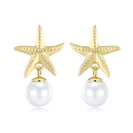 Brincos de estrela do mar em prata S925 com pérola de água doce. Design elegante e perfeito para um visual sofisticado e charmoso. — foto 3