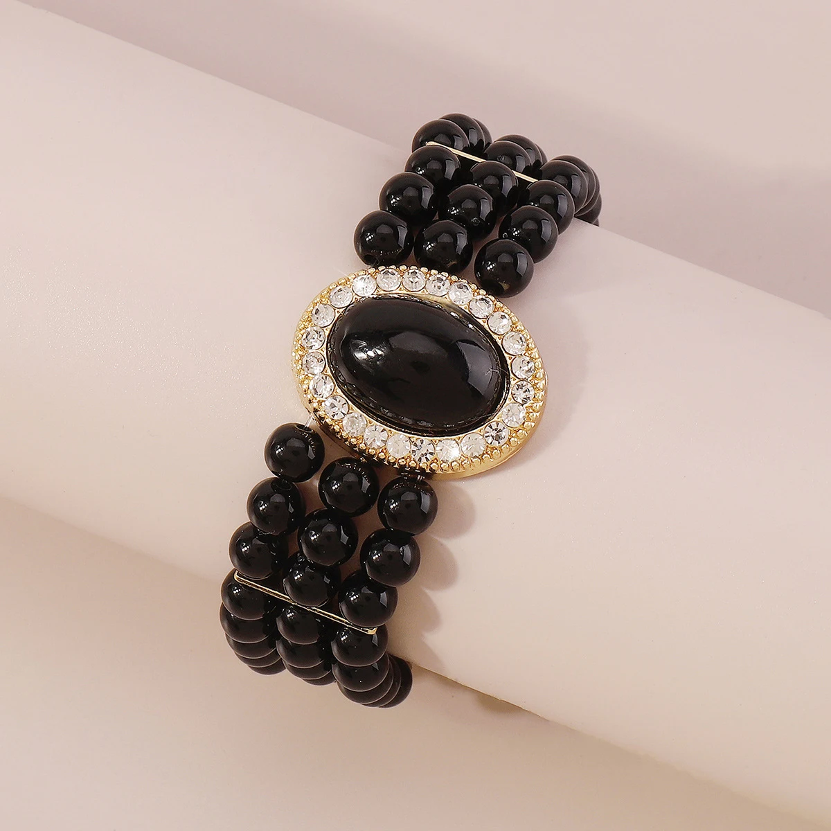 Pulseira elegante clássica com pérolas, strass e resina, rica em detalhes e perfeita para adicionar um toque sofisticado e rico ao seu visual. — foto 9