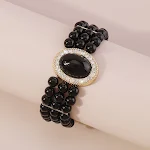 Pulseira elegante clássica com pérolas, strass e resina, rica em detalhes e perfeita para adicionar um toque sofisticado e rico ao seu visual. — foto 9