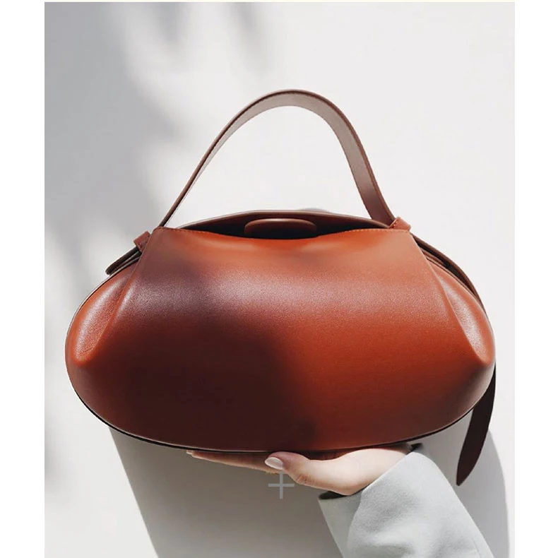 Bolsa feminina casual para carregar na mão ou transversal. Perfeita para o dia a dia, com design moderno e praticidade em um só produto. — foto 6